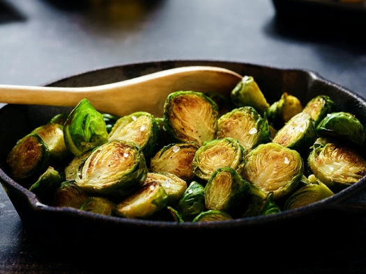 Cooked Brussels Sprouts in cast iron pan